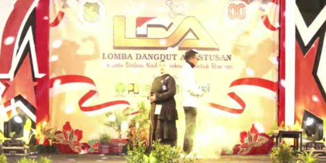 
					Foto : Lilik Dan Sucipto Utusan Diskominfo Dalam Lomba Dangdut Agustusan ( LDA )