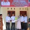 Foto : Bupati Aceh Barat Tarmizi, SP.M.M Menyerahkan Kunci Rumah Kepada Penerima Manfaat di kecamatan Bubon 