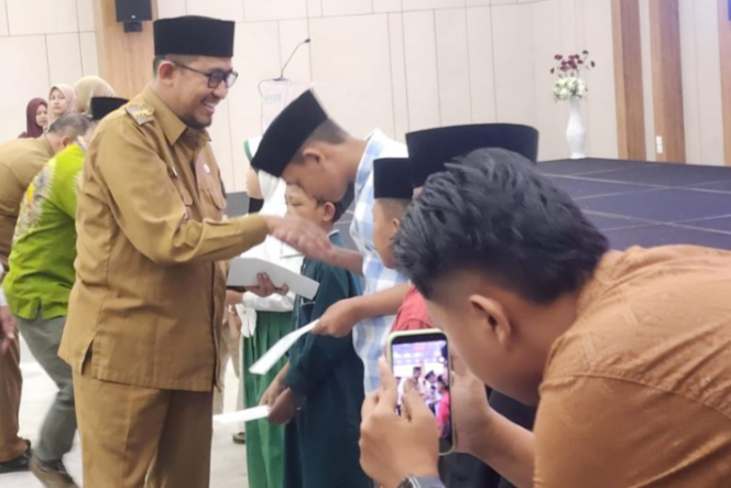 
					Foto : Bupati Sumenep Achmad Fauzi Wongsojudo Dalam Momen Tahun Baru Islam 